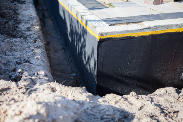 Professional Emergency Waterproofing technician working in Holland, OH